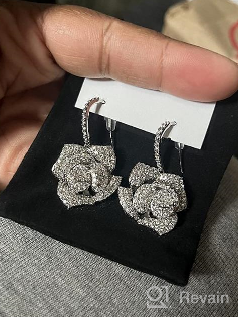 img 1 attached to Dazzle with Huggie CZ Flower Dangle Stud Earrings – A Charmed Fashion Statement for Women and Girls review by John Chembola