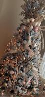 картинка 1 прикреплена к отзыву 60 Inch White Faux Fur Christmas Tree Skirt - Perfect For Merry Christmas Decorations! от Reggie Kern