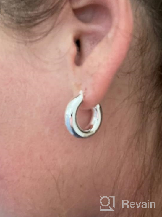 img 1 attached to Stylish Chunky Hoop Earrings for Women - Shiny Polished Round-Tube Hoops with Sterling Silver Posts: Perfect Gift for Women and Girls review by Michael Tucker
