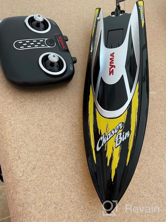 img 1 attached to SYMA Q7 RC Boat: 20+ Km/H 2.4GHz Fast Racing For Pools & Lakes, Capsize Recovery + Low Battery Alarm, Gifts For Boys & Girls review by Justin Spence
