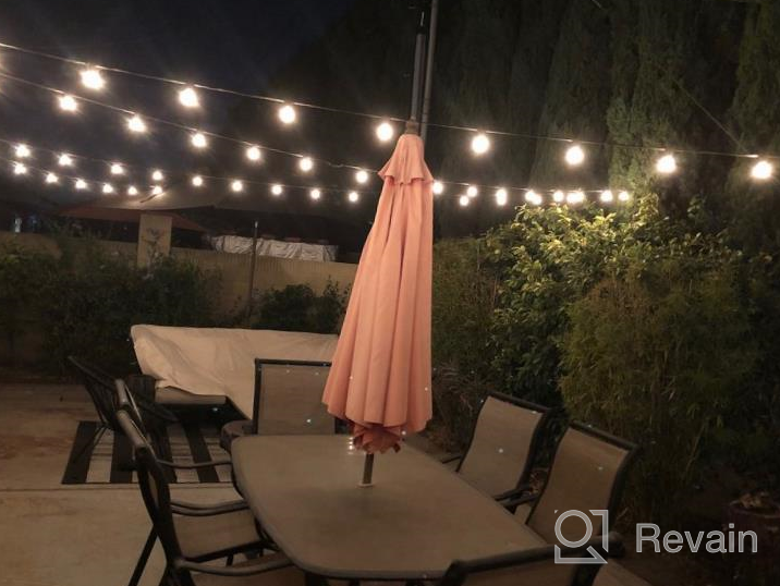 img 1 attached to HBN 100ft Outdoor String Lights - Premium Incandescent Bulbs for Garden, Patio, Porch, Courtyard & More | Dimmable, Waterproof & Warm 2200K White | 102 G40 Bulbs + 2 Extra review by Jonah Riggle
