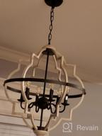 img 1 attached to Rustic Orb Chandelier With Adjustable Height - TZOE 4-Light Metal Vintage Chandelier For Dining Room, Living Room, And Kitchen review by Sam Carter
