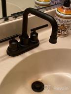 img 1 attached to 2-Handle 4-Inch 3-Hole RV Sink Bathroom Faucet With Lift Rod Drain Stopper & Supply Hoses By WOWOW Black Centerset review by Paul Zimmer