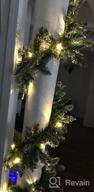 img 1 attached to WBHome Pre-Lit 9 Feet/106 Inch Christmas Garland With 50 LED Lights, Frosted Snowy White With Pinecones And Red Berries Holiday Decorations, Battery Operated (Batteries NOT Included) review by Ben Duncan