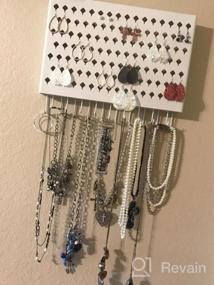 img 5 attached to Black Wall Mounted Jewelry Organizer With 117 Holes And 12 Hooks For Earrings, Necklaces, And Bracelets - Display Hanger By JackCubeDesign (16.54 X 12.2 X 0.75 Inches)