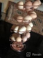 img 1 attached to Toplife Spiral Design Metal Egg Skelter Dispenser Rack: Stylish Storage & Display Solution In White review by Greg Muin