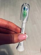 img 2 attached to 💎 Set of 4 Philips Sonicare HX6064/10 Best White W2 Brush Heads with BrushSync for Effective Teeth Whitening review by Agata Siejwa ᠌