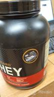 img 1 attached to Optimum Nutrition's Vanilla Ice Cream Gold Standard Whey Protein Powder, 2lb - May Vary in Packaging review by Hongseok Bak ᠌
