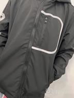 img 1 attached to Waterproof Hooded Rain Jacket for Kids - Lightweight Fleece Lined Coat for Boys and Girls - Windbreaker Raincoat review by Josue Zepeda