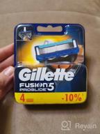 img 1 attached to 🪒 Optimal Shaving Experience: Gillette Fusion ProGlide Men's Razor Replacement Cassettes - 4 Pieces with 5 Blades and Precision Trimmer for Hard-to-Reach Areas review by Minoru  Inui ᠌