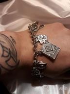 img 1 attached to 🐾 Mythical Fairytale Lucky Charm Bracelet with Celtic Cat, Cross, Moon Face, and Leaf Accents by RechicGu review by Collin Donahue