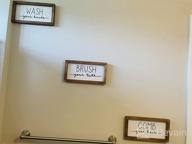 img 1 attached to 🚽 Set of 3 LIBWYS Bathroom Sign & Plaque - Decorative Rustic Wood Farmhouse Wall Decor for Bathroom - Wash Your Hands, Brush Your Teeth, Comb Your Hair (Black) review by Jesse Runninger