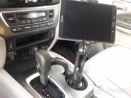 img 1 attached to IKross 2-In-1 Cup Mount Holder: Perfectly Secure Tablet And Smartphone Holder For Your Car review by Marco Carpenter