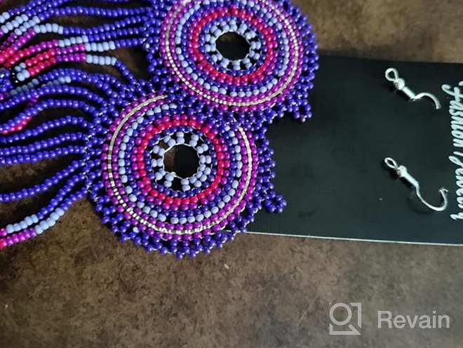 img 1 attached to 🌸 Handmade Bohemian Dream Catcher Beaded Earrings: Statement Long Beaded Hoops with Tassel Dangle, Big Boho Indian Seed Bead Hoop Fringe Chandelier Drop Earrings for Women and Girls Jewelry review by Ethan Carpenter