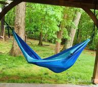 img 1 attached to Double Camping Hammock With Lightweight Nylon Parachute And Tree Straps - Perfect For Travel, Backpacking, And Outdoor Adventures review by Jyothish Pillai
