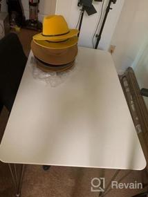 img 4 attached to Современный белый обеденный стол для гостиной, прямоугольный кухонный стол 47 дюймов с серебряными ножками-шпильками, места для 4-6 человек (простая сборка)