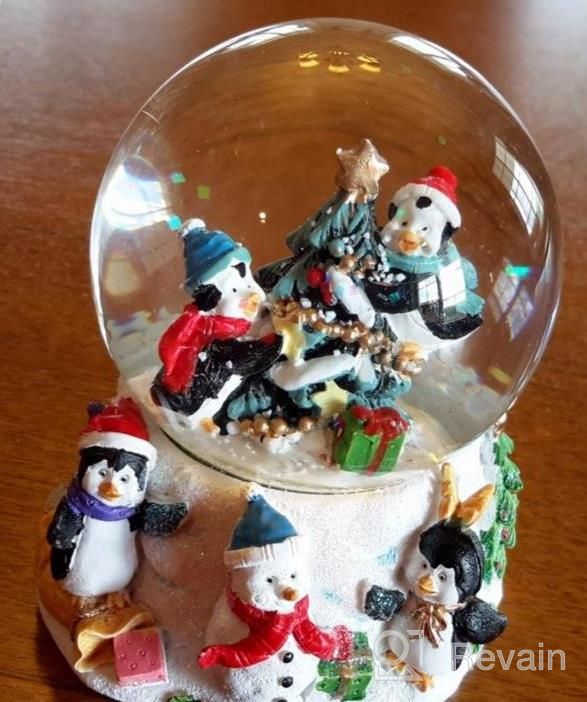 img 1 attached to Festive Penguin Snow Globe - Decorate Your Christmas Tree With A Magical Winter Wonderland! review by Elizabeth Carrasco