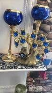 img 1 attached to Turkish Blue Evil Eye Gold Fortune Tree Home Decor With Elephant Figurine And Green Flowers review by Teresa Thomas