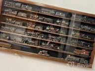 img 1 attached to Securely Display & Protect Your HO Scale Model Train Collection With UV Cabinet Wall Rack review by Clint Fick