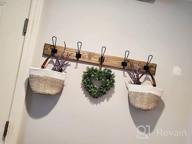 img 1 attached to Boho Wall Decor - OrganiHaus 2-Pack Brown Hanging Storage Baskets With Handles For Plants And Organization In Bathroom Or Home - 7X6 Inch Wall Baskets For Stylish And Functional Hanging Storage review by Chris Wagner