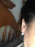 img 1 attached to Stylish And Hypoallergenic Sterling Silver Cubic Zirconia Earrings With Adorable Dog And Cat Paw Designs review by Briceston Criss