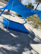 img 1 attached to Portable Beach Tent Sun Shelter 10X10Ft UPF50+ Protection With 4 Sand Bags & Aluminum Poles For Family Camping, Outdoor And Beach Use. review by Adrian Allen