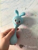 img 1 attached to 🎶 Blue Alilo Smarty Bunny Shake & Tell Musical Toy Rattle for Newborns and Infants - Soother with Lullaby Song Story, Music Player & Games review by Anastazja Jelisiejew ᠌
