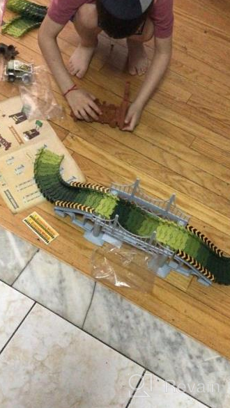 img 1 attached to 159 Pcs Dinosaur Glow In The Dark Race Train Track Toy For Boys & Girls Ages 3-7 | DinoManiacs By JitteryGit review by Anthony Savage