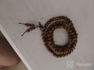 img 1 attached to 108 Prayer Beads Mala Bracelet: Natural Wood Tibetan Buddhist Buddha Meditation Necklace Mala Bracelet for Ultimate Mindful Experiences review by Marklen Baeskens