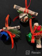 картинка 1 прикреплена к отзыву Набор из 36 металлических рождественских колокольчиков с листьями остролиста, ягодами, сосновыми шишками и ленточными украшениями-бабочками — 6 дизайнов для упаковки подарков и елочных украшений от ADXCO от Andrea Walters