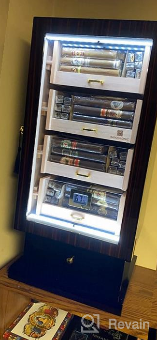 img 1 attached to Cigar Aficionados Rejoice: Woodronic'S Digital Humidor Cabinet For 100-150 Cigars, Spanish Cedar Lining, And 2 Crystal Gel Humidifiers In A Glossy Ebony Finish - Perfect Gift For Fathers! review by Jarod Lacy