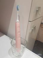 img 1 attached to Philips Sonicare DiamondClean 9000 HX9911 sonic toothbrush, pink review by Ada Atusia