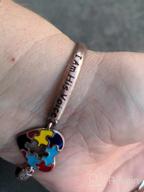 img 1 attached to Autism Awareness Bracelet: LQRI - Autism Puzzle Piece Charm Jewelry Gift for Autistic Children, Teachers, Moms - Symbolizing My Voice, My Heart review by Gerardo Cibrian