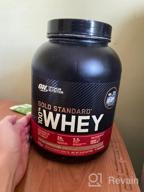 img 1 attached to Optimum Nutrition's Vanilla Ice Cream Gold Standard Whey Protein Powder, 2lb - May Vary in Packaging review by Vinay Sornsri ᠌