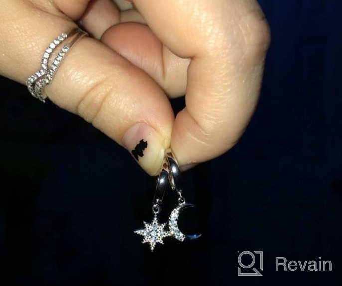 img 1 attached to 💫 Sparkling Sterling Silver Hoop Earrings with Reffeer Crystals: Star Moon Dangle Design for Women and Teen Girls review by Laura Valenzuela