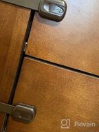 картинка 1 прикреплена к отзыву CUTESAFETY Child Proof Safety Locks - Baby Proofing Cabinet Lock With 6 Extra 3M Adhesives - Adjustable Strap Latches To Cabinets,Drawers,Cupboard,Oven,Fridge,Closet Seat,Door,Window (Black, 6) от Andy Kucrud