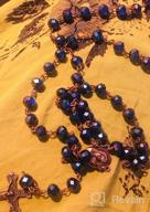 картинка 1 прикреплена к отзыву Винтажное религиозное ожерелье Назаретского магазина с глубокими синими хрустальными бусинами, католическим молитвенным подвеском, включающим медаль и крест с святой почвой Иерусалима - коллекция древних росариев Святой Земли. от Tsuyoshi Tendencies