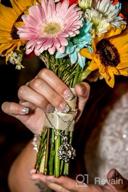 картинка 1 прикреплена к отзыву Ожерелье с подвеской в виде цветка лотоса с мини-урной - ювелирные украшения для памятных прахов после кремации от Tyrell Hudson