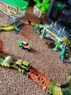 img 1 attached to 159 Pcs Dinosaur Glow In The Dark Race Train Track Toy For Boys & Girls Ages 3-7 | DinoManiacs By JitteryGit review by Travis Petty