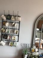 img 1 attached to MyGift Black Metal Wall Mounted Coffee Mug Holder Rack With 5 Tier, Hanging Mug And Cup Storage Organizer With 18 Hooks review by Marcy Padia