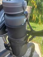 img 1 attached to Bike Bottle Holder Bag With Phone Storage & Insulation For Touring & Commuting review by Robert Carter
