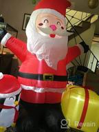 картинка 1 прикреплена к отзыву 6 FT Inflatable Santa With LED Lights - Perfect Christmas Decorations For Outdoor Yard, Garden, Patio & Lawn Party! от Nick Griffith