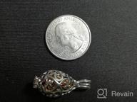 картинка 1 прикреплена к отзыву Ожерелье с подвеской в форме цветка лотоса для хранения праха от Penny Lewis