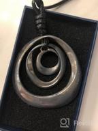 img 1 attached to Bohemian Silver Pendant Necklace for Women Teens Girls - Stylish Long Pendant with Natural Black Rope Chain and Gift Box review by Robert Castro