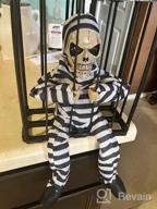 img 1 attached to Halloween Animatronic Talking Prisoner Decoration With Motion Sensor And Light - Spooky Indoor/Outdoor Prop For Kids And Adults | Clearance Halloween Décor review by Edy Yukface