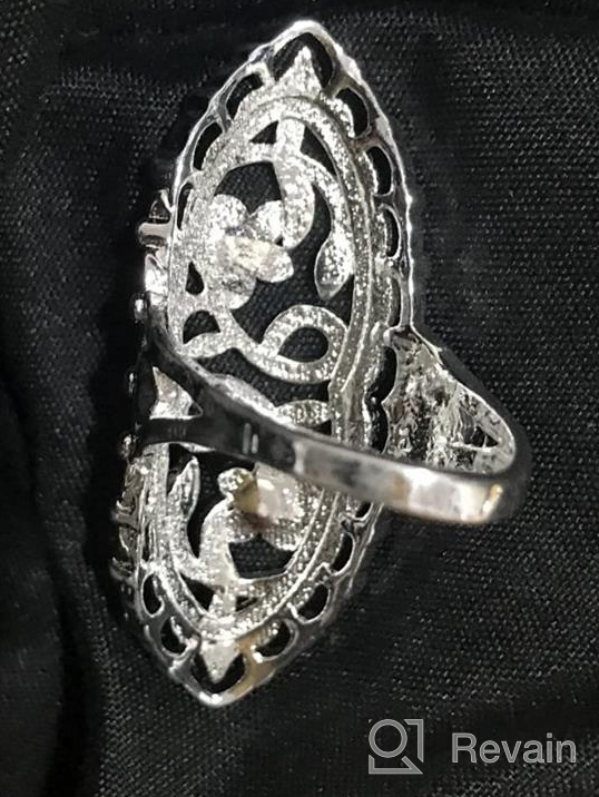 img 1 attached to Vintage Hollow Long Celtic Knot Daisy Flower Filigree Band Ring - XCFS 925 Sterling Silver Statement Piece with Floral Design review by Louis Abrams