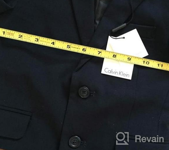 img 1 attached to 🕴️ Stylish & Versatile Calvin Klein Boys' Bi-Stretch Blazer Suit Jacket with 2-Button Single Breasted Closure review by Jeremy Levendusky