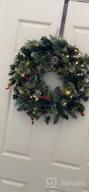 img 1 attached to SHareconn 24 Inch Prelit Artificial Christmas Wreath With 15" Hanger, Multi-Color Lights With Timer By Batteries Operated, Pine Cones And Red Berries For Front Door Wall Windows Xmas Decoration,Snow review by Jack Edwards