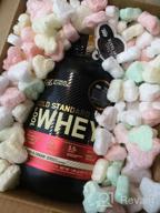 img 1 attached to Optimum Nutrition's Vanilla Ice Cream Gold Standard Whey Protein Powder, 2lb - May Vary in Packaging review by Agata Roguska ᠌