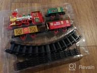 img 1 attached to Experience The Magic Of The Holidays With PUSITI Classic Christmas Train Set - Battery Operated Locomotive Engine And 11.5 Ft Tracks With Lights And Sounds For Kids' Delight review by Don Santos